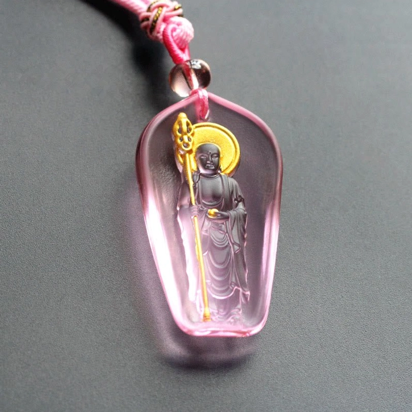Pink Liuli crystal Ksitigarbha pendant with braided cord and standing Buddha scepter design