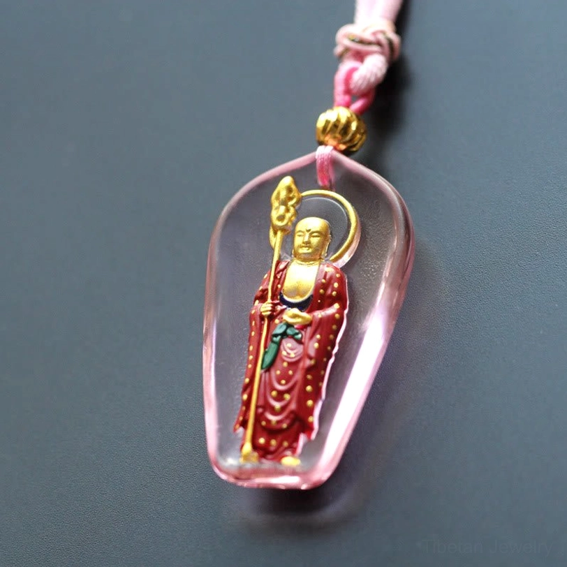 Light pink Ksitigarbha Buddha Liuli crystal trapezoidal pendant with standing gilded bodhisattva and pink braided rope necklace