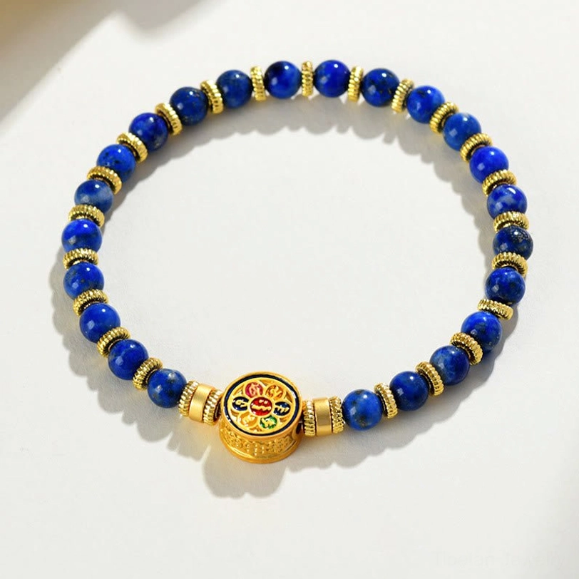 Tibetan lapis lazuli Om Mani Padme Hum bracelet showing complete bead arrangement and sacred charm detail