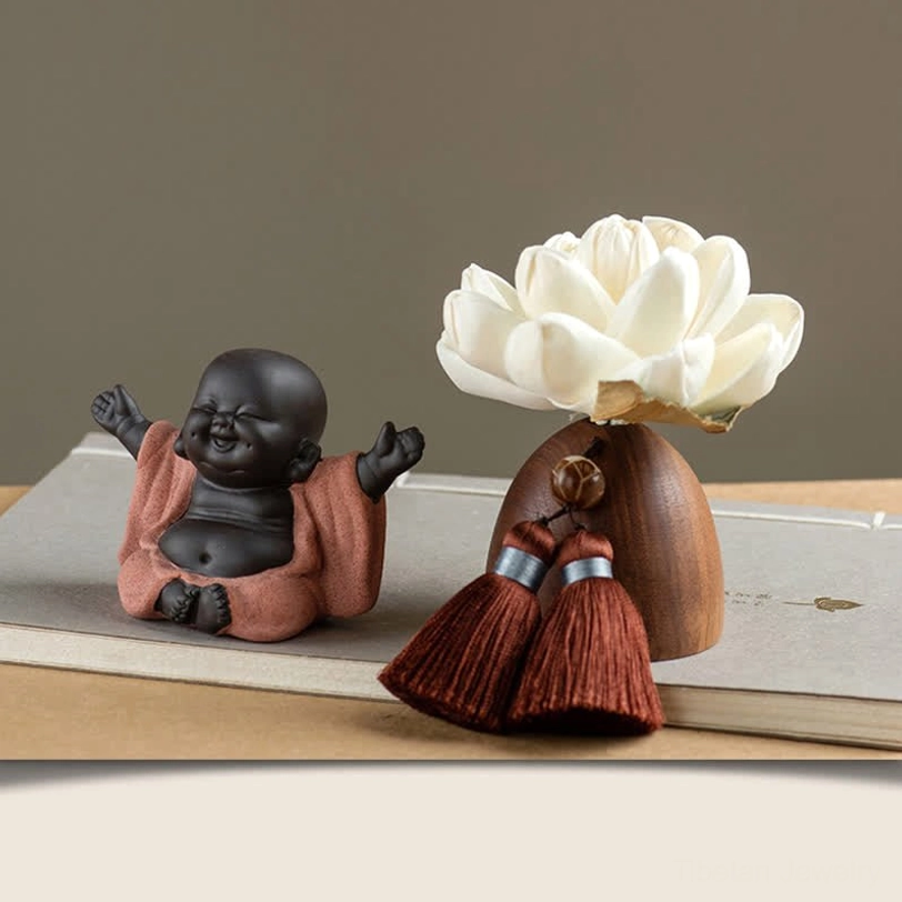 Laughing Buddha happy smiling reclining figurine with lotus decor and double tassels on wooden holder