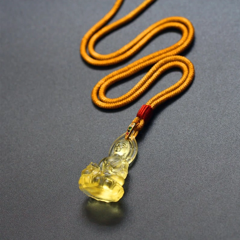 Light blue Medicine Buddha Liuli necklace complete presentation, celestial translucent crystal on dark blue rope with metal bail