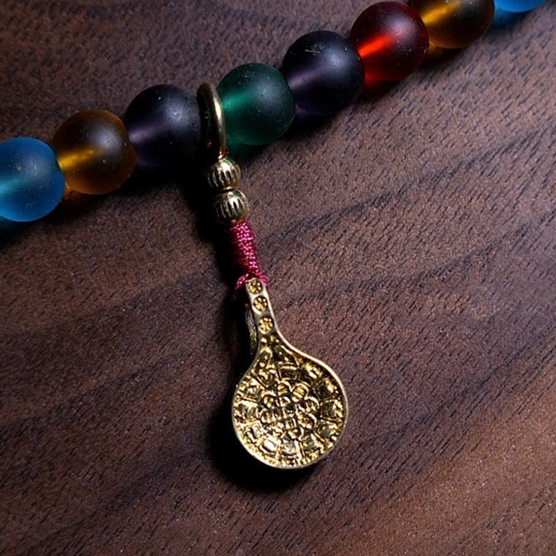 Multicolored frosted liuli glass beads close-up detail showing texture and frosted finish quality