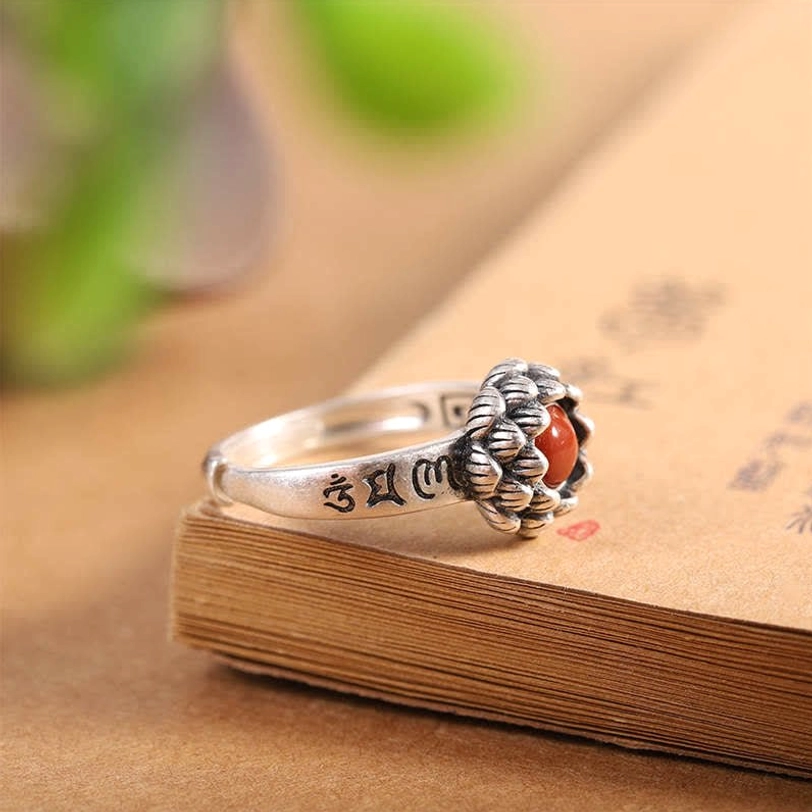Handmade lotus red agate silver ring back view, showing reverse Sanskrit engraving