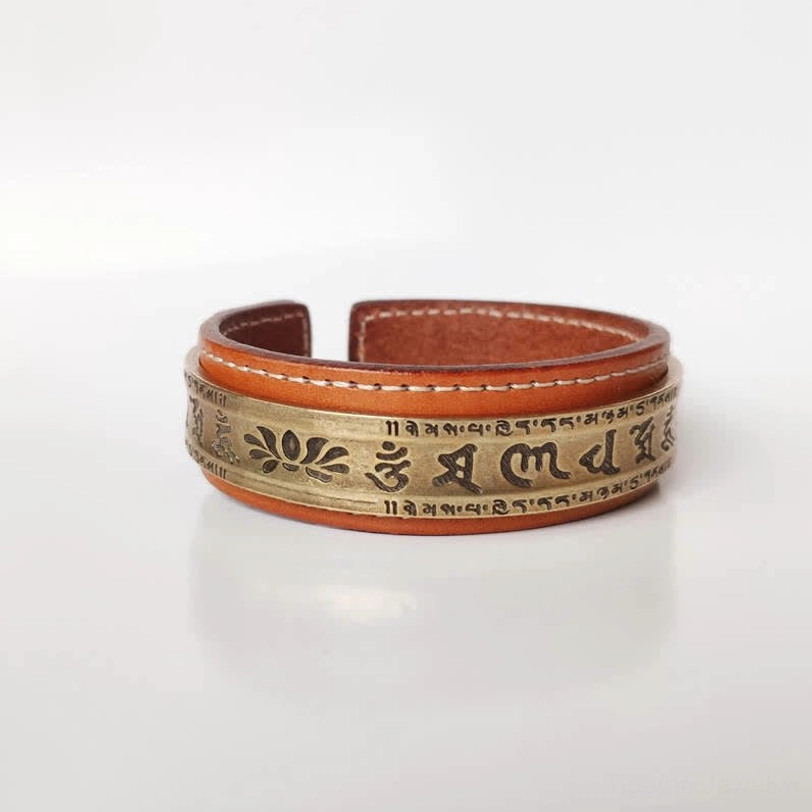 Tibetan leather and copper cuff bracelet with engraved lotus flower and Tibetan script