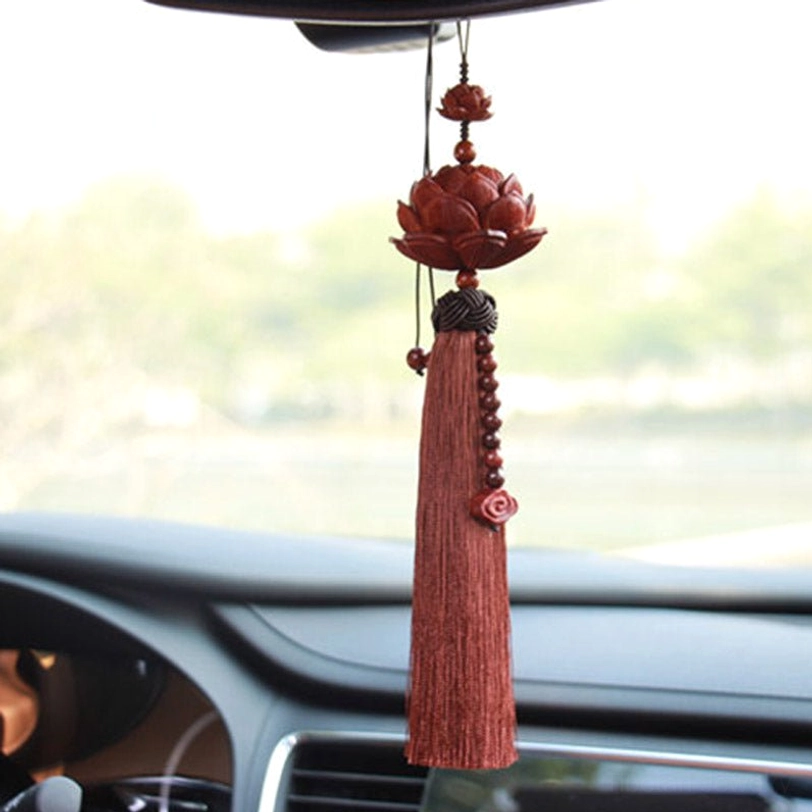Tibetan lotus tassel car hanging ornament positioned near rearview mirror with cloud pendant and hanging beaded chain