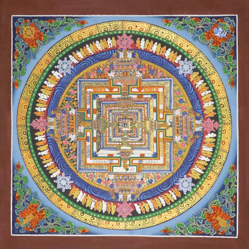 Hand-painted Kalachakra mandala thangka detail showcasing vibrant colors, gold accents and intricate Buddhist symbolism