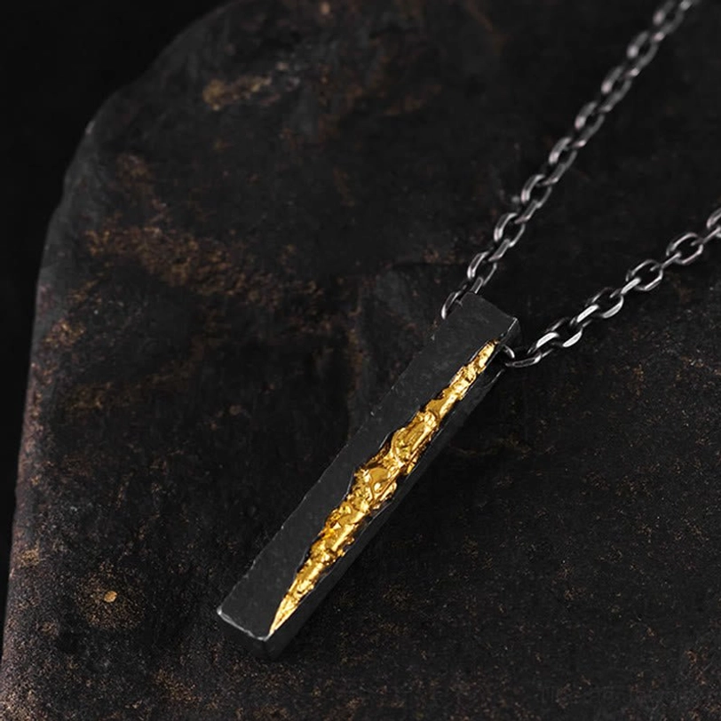 Tibetan necklace pendant with delicate chain and dual-tone silver-gold design