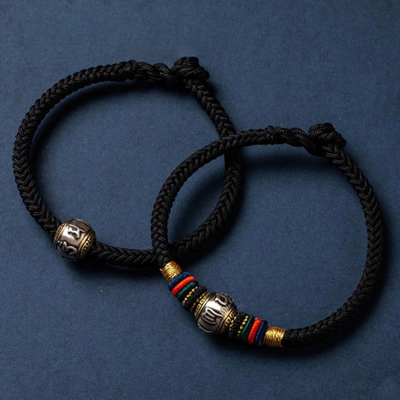 Tibetan Om Mani Padme Hum bracelet in maroon showing King Kong knot protection design