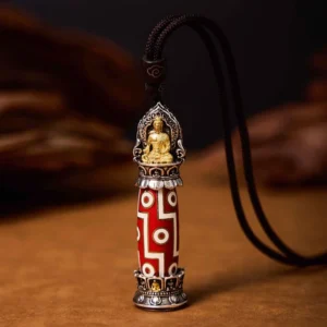 Tibetan Medicine Buddha nine-eye dzi bead pendant necklace front view with red-white geometric pattern and silver-gilt Buddha ornament