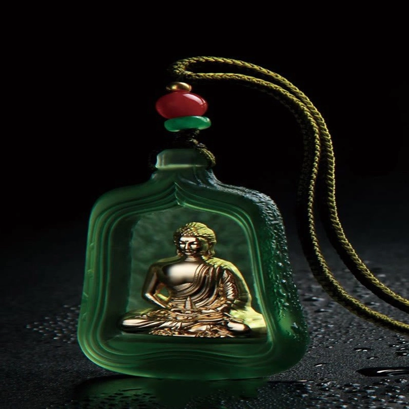 Green Medicine Buddha Liuli crystal pendant with golden seated Buddha figure on olive braided cord