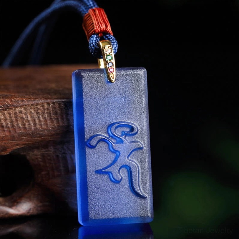 Medicine Buddha Tibetan Liuli crystal pendant necklace with embossed Sanskrit mantra, frosted dark blue glass handcrafted Buddhist healing jewelry