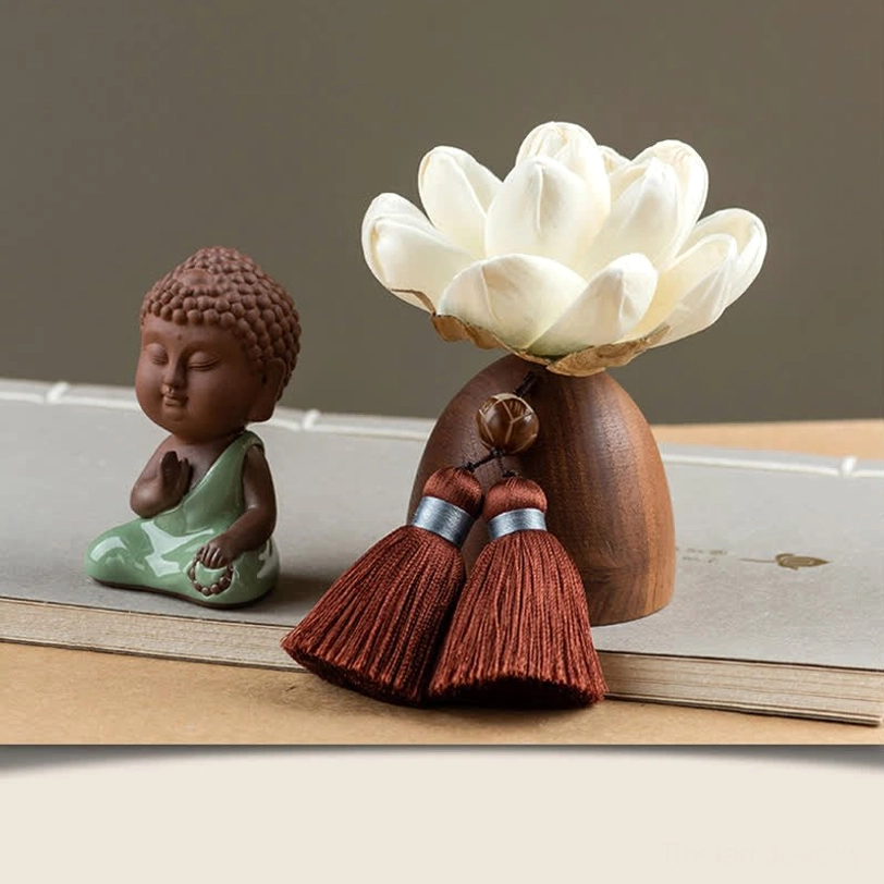 Meditating Tathagata Buddha figurine in meditation pose with lotus flower and wooden base decoration