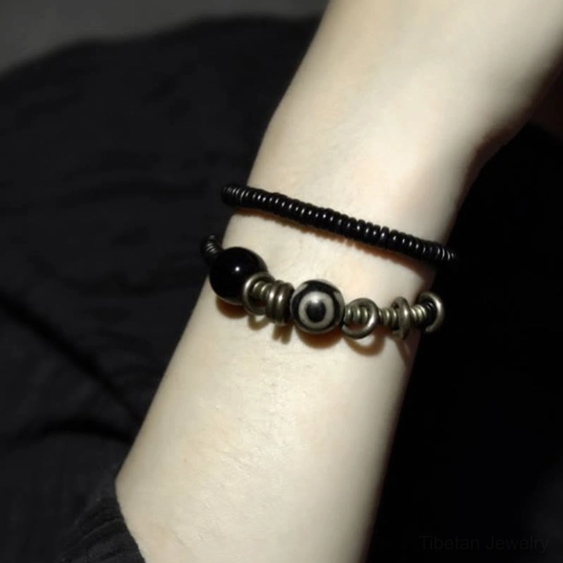 Meditation bracelet with sacred Dzi bead green sandalwood and protective black onyx