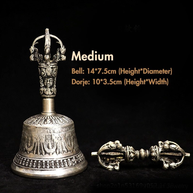 Medium size Tibetan bell and dorje set on black studio background, bell 14x7.5cm dorje 10x3.5cm, handcrafted copper display
