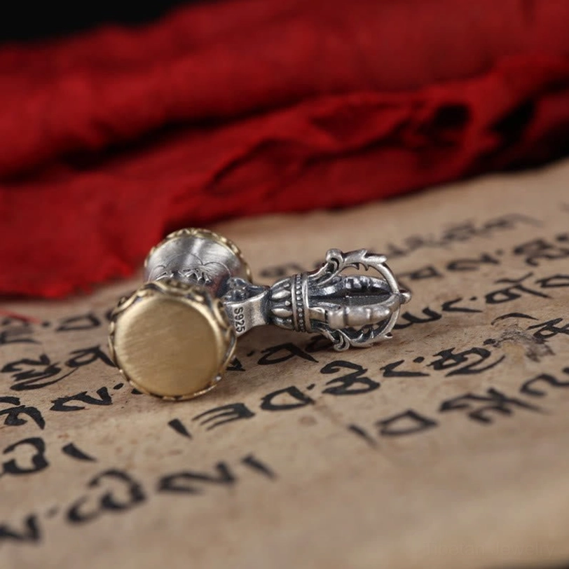Mini dorje bell pendant (13.5x27mm) in authentic sterling silver with fine handcrafted details and loop