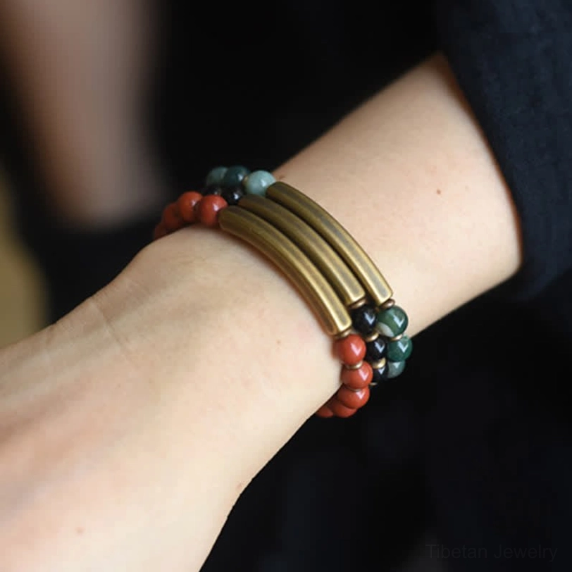Moss Agate green stone healing bracelet worn on wrist - natural crystal detail