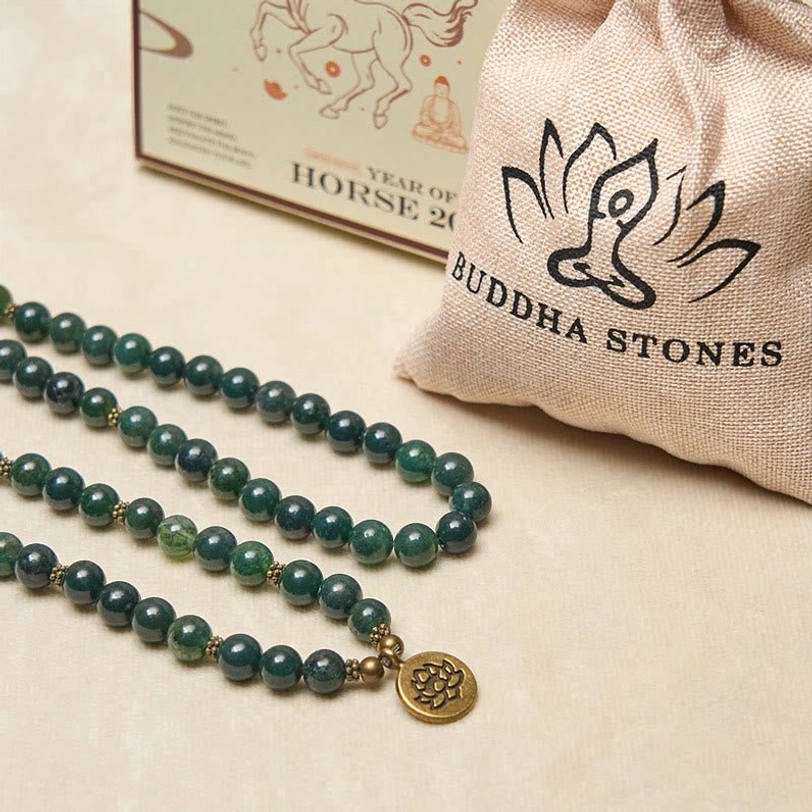 Moss agate malas with branded packaging set, showing two coiled beaded strands, storage bag, and gift box presentation