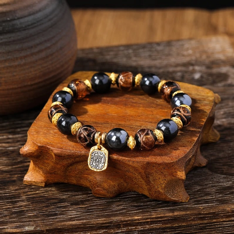 Multicolored blue liuli glass Zakiram wealth bracelet detail showing handcrafted beads and artisan quality