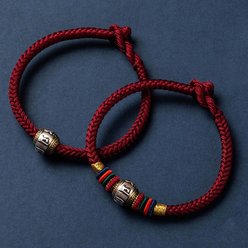 Multicolored Om Mani Padme Hum Tibetan bracelet with rainbow threads and silver charm for chakra balance