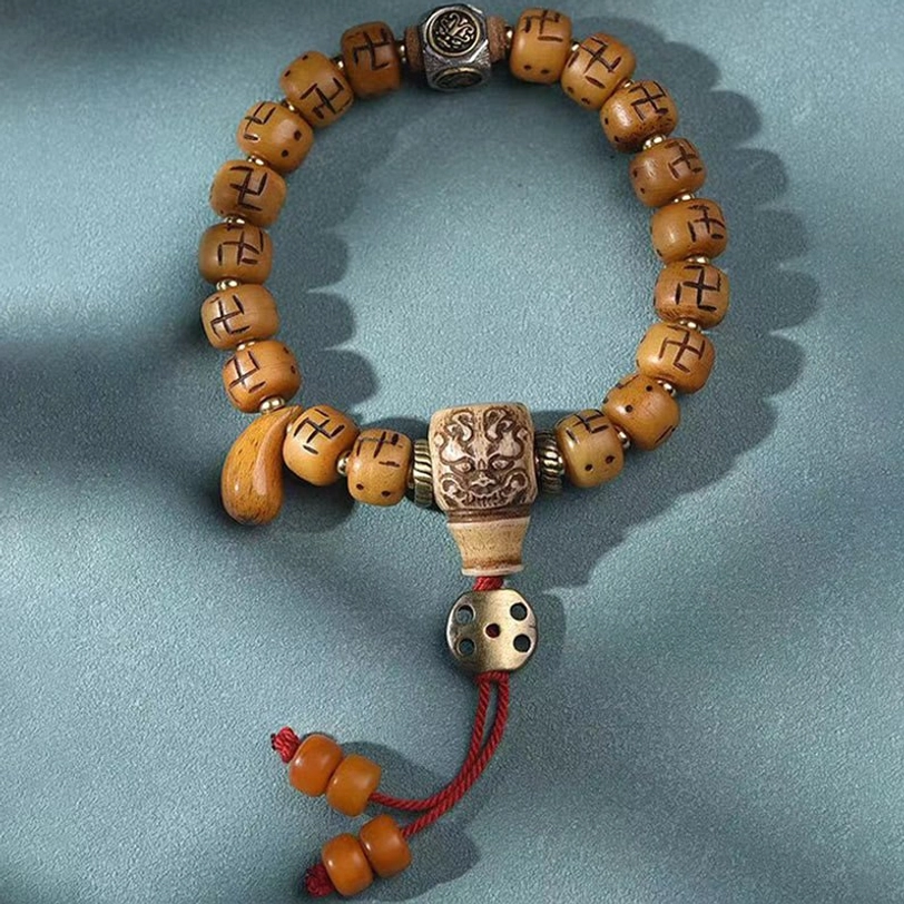 Natural camel bone Tibetan bracelet with dzi bead and tassel - handmade spiritual protection amulet jewelry