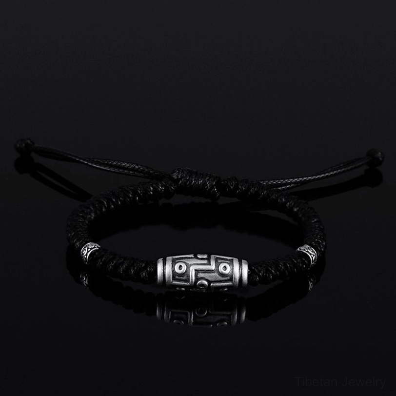 Nine-eye dzi bead silver bracelet comparison view, showing original Tibetan design authenticity and craftsmanship