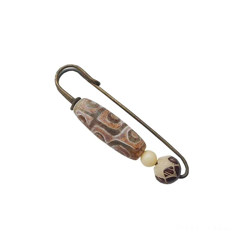Nine-eye dzi bead bodhi lotus protection brooch front view on white background, full design showcase
