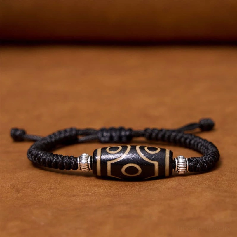 Tibetan nine-eye dzi bead bracelet gift set presentation highlighting prosperity and protection benefits