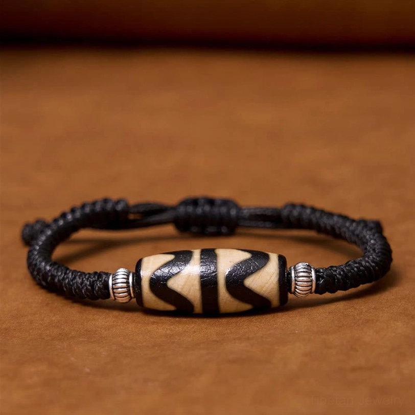 Tibetan nine-eye dzi bead bracelet wisdom symbol showing expanded consciousness and obstacle removal