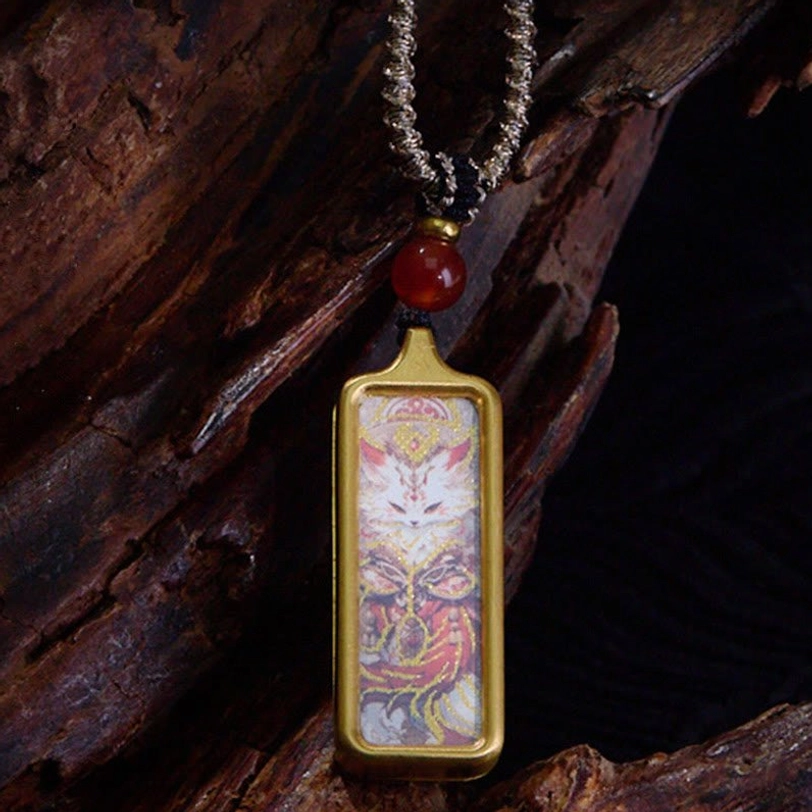 Nine-tailed fox Tibetan hand-painted thangka pendant necklace featuring white fox pattern in gold frame with red agate bead
