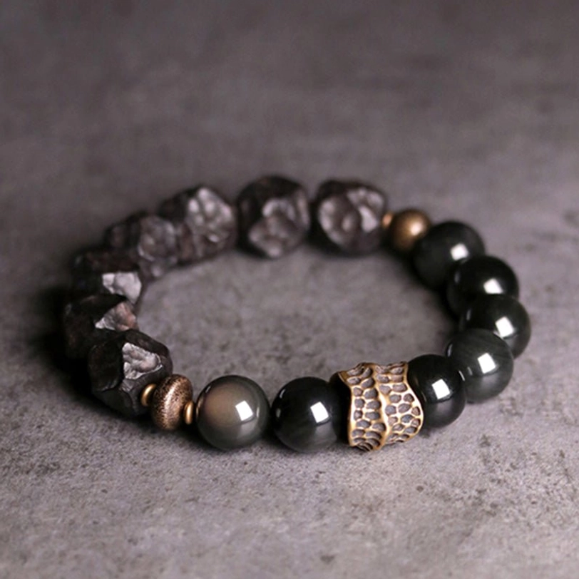 Matching pair of black obsidian ebony wood copper bracelets for couples with protective spiritual meaning