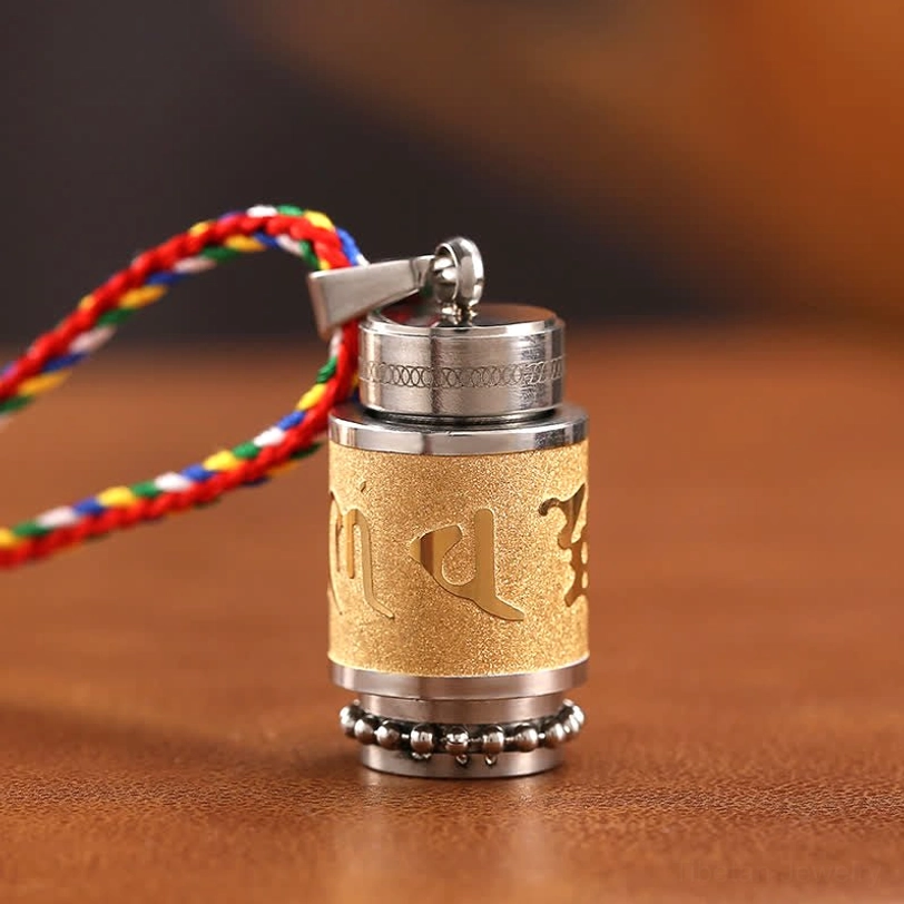 Om Mani Padme Hum Tibetan necklace pendant with gold finish and colorful woven string