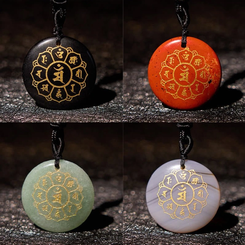 Om Mani Padme Hum mantra pendant with crystal stone showing sacred Sanskrit text detail
