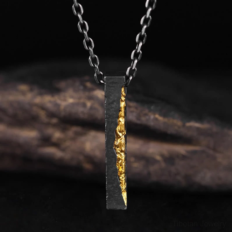Vertical Om Mani Padme Hum sterling silver pendant with aged patina