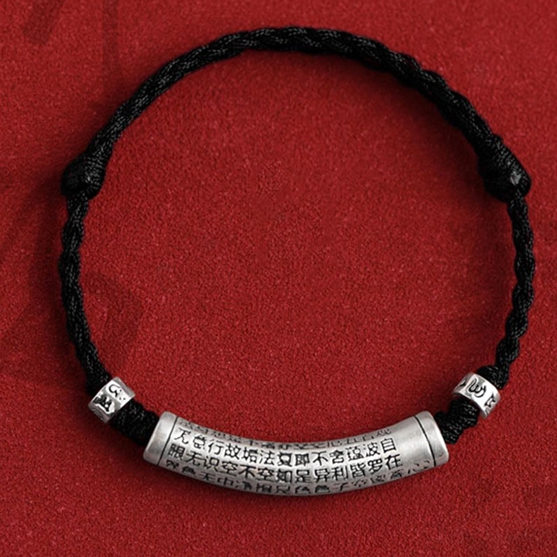 Om Mani Padme Hum black rope mantra bracelet with 999 sterling silver pendant showing protective energy