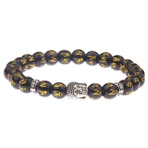 Handmade Tibetan Buddhist mantra bracelet featuring black beads with gold Om Mani Padme Hum characters and silver Buddha head charm