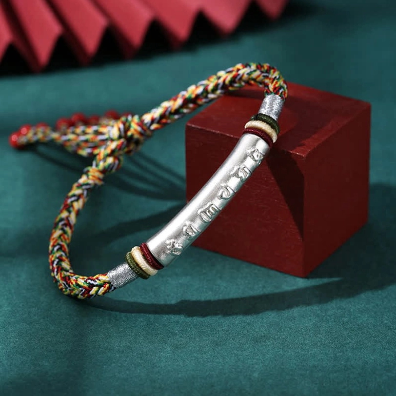 Colorful Tibetan Buddhist mantra bracelet with mixed hues and 999 silver engraved tube