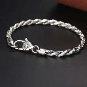 925 Sterling Silver Om Mani Padme Hum Double Dorje Vajra twisted rope bracelet with ornate lobster clasp - three-quarter top view