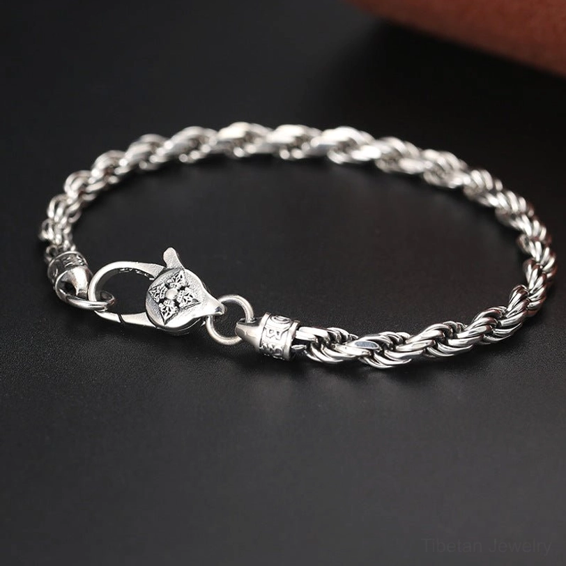 925 Sterling Silver Om Mani Padme Hum Double Dorje Vajra twisted rope bracelet with ornate lobster clasp - three-quarter top view