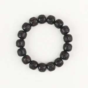 Complete circular view of handcrafted ebony wood mantra bracelet showing all carved beads