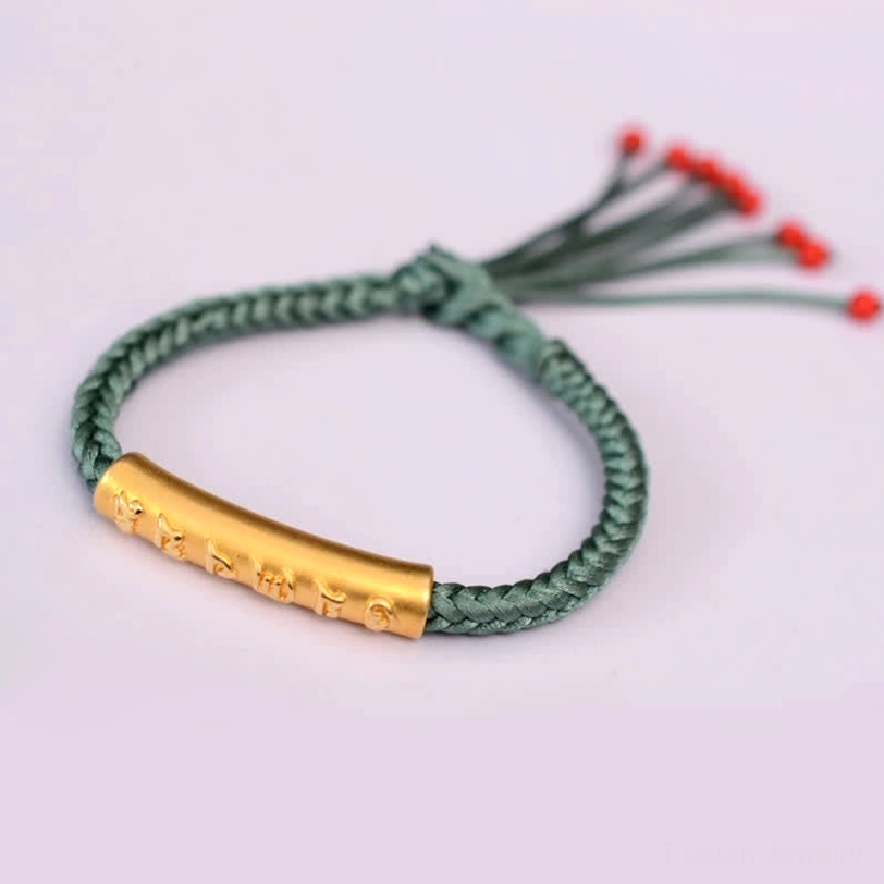 Gold plated 999 sterling silver Om Mani Padme Hum bracelet with green braided rope
