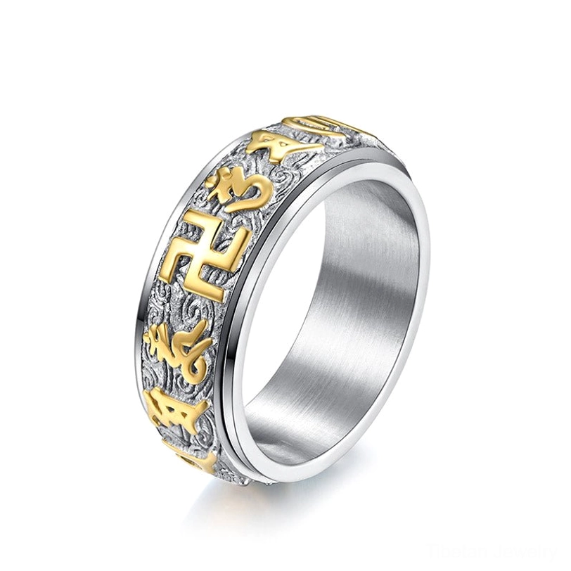 Om Mani Padme Hum titanium steel spinner ring in gold tone finish with detailed Sanskrit carving on white background