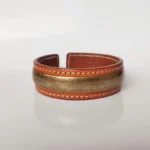 Tibetan Om Mani Padme Hum leather and copper cuff bracelet with white stitching detail