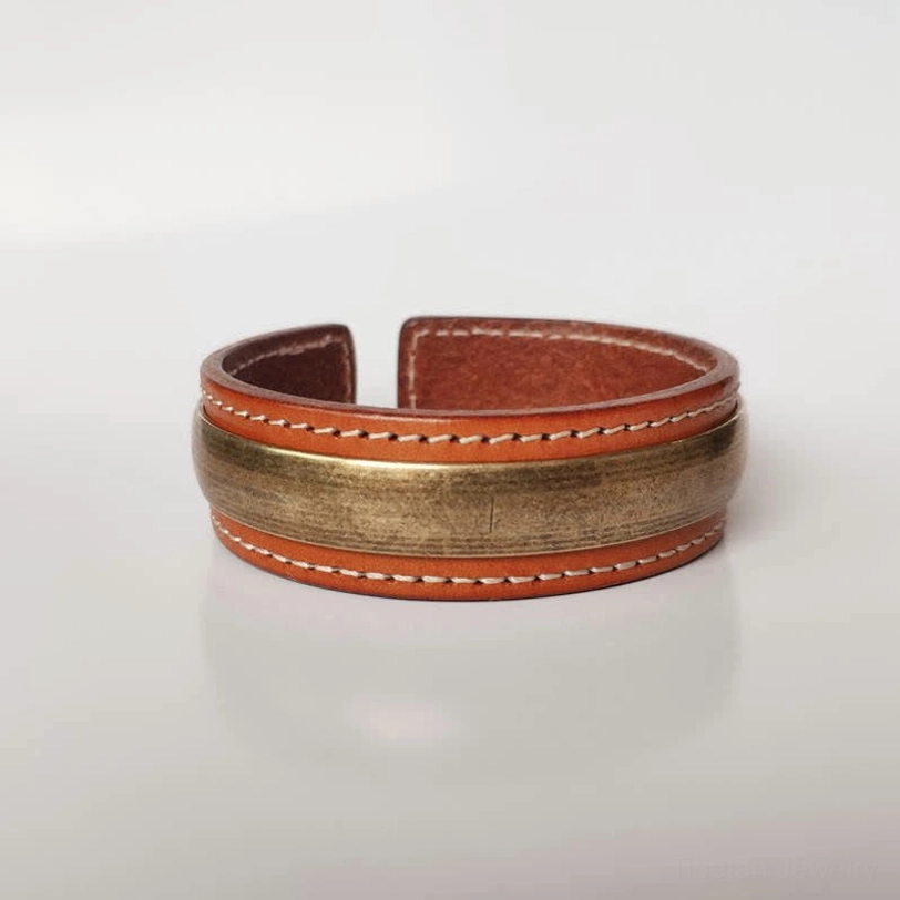 Tibetan Om Mani Padme Hum leather and copper cuff bracelet with white stitching detail