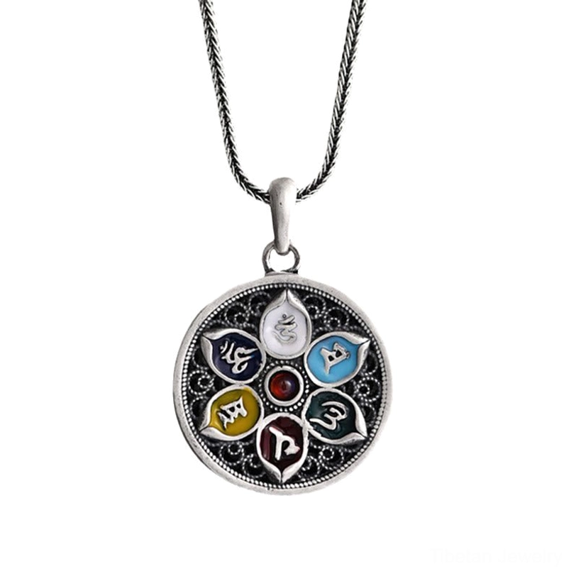 Om Mani Padme Hum silver pendant necklace detail showcasing filigree craftsmanship and sacred Buddhist mantra symbolism