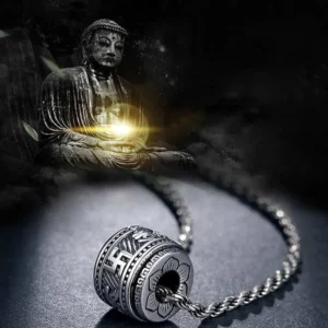 Buddhist mantra barrel pendant with antique silver finish and metal chain, front angle view displaying rotatable design with sacred mantras