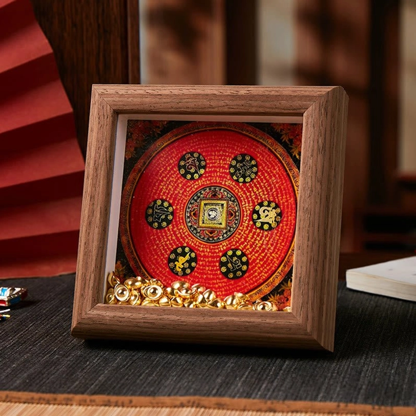 Tibetan Buddhist thangka frame with red sutra mandala design and golden ornaments on dark brown wood frame, sacred home decor