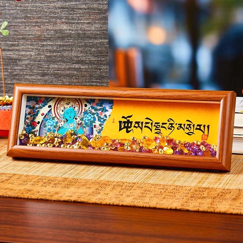 Tibetan thangka frame style 2 with blue Buddhist deity painting paired with amethyst and citrine crystals on desktop