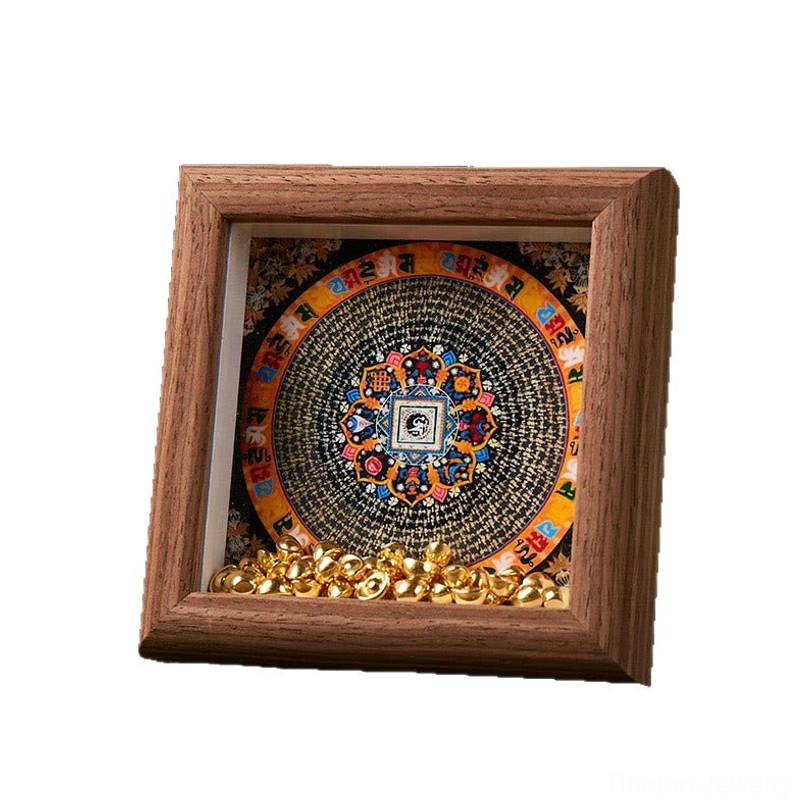 Om Mani Padme Hum thangka frame front flat view, black mandala design with golden accents on dark brown wood, meditation decor