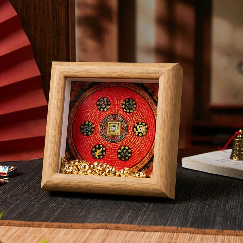 Thangka photo frame featuring red sutra mandala pattern with golden ingot embellishments on light natural wood finish