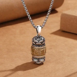 Om Mani Padme Hum Tibetan mantra pendant necklace front view with carved lotus and sutra details in silver-gold tone